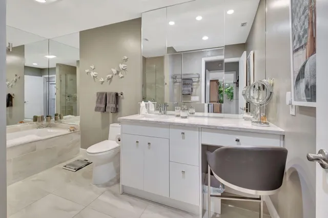 an aerial view of a house with a lake view