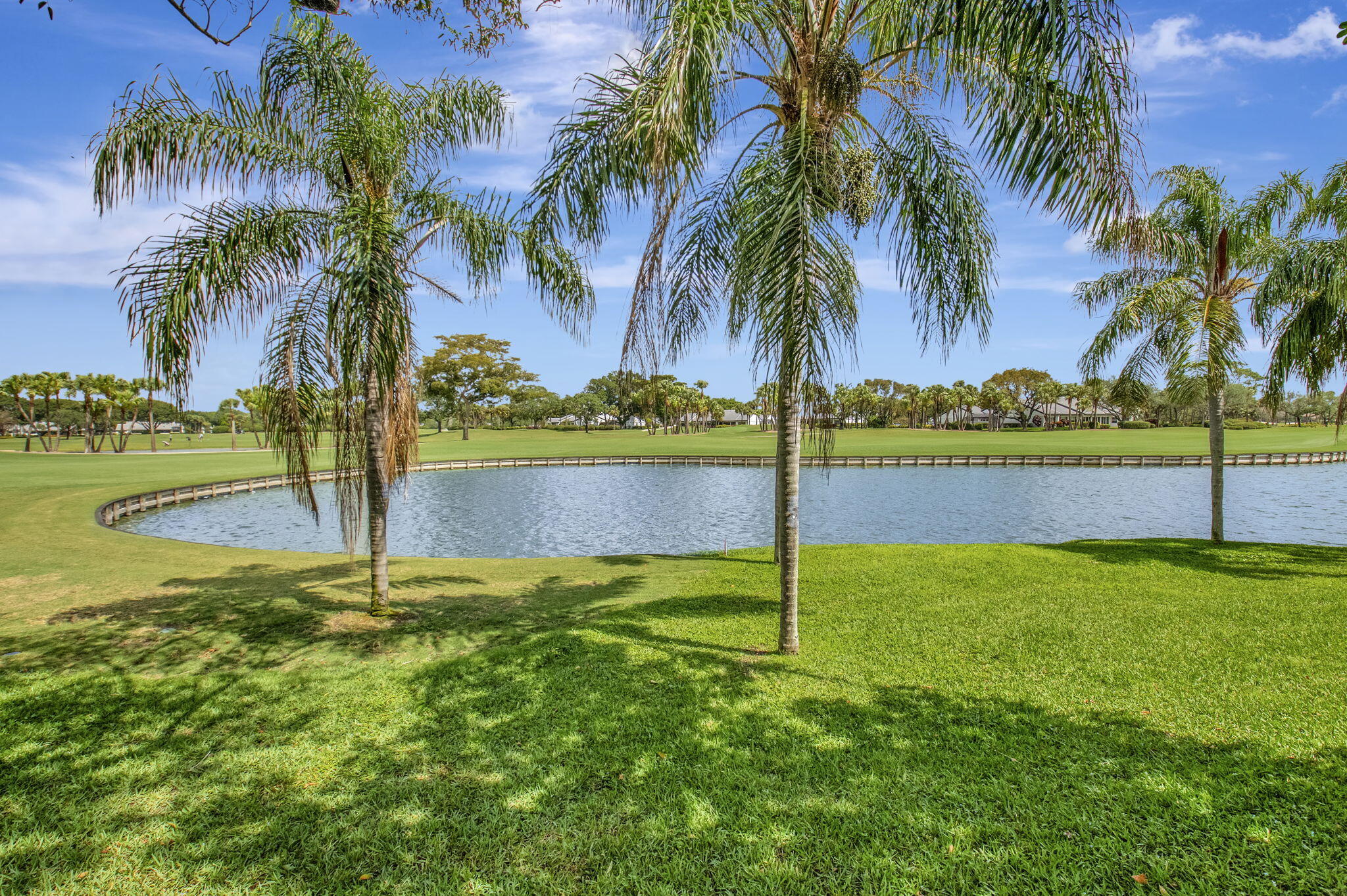 27 Eastgate Drive, Unit C Boynton Beach, FL 33436 - Photo 41 of 87 a view of a park with palm trees