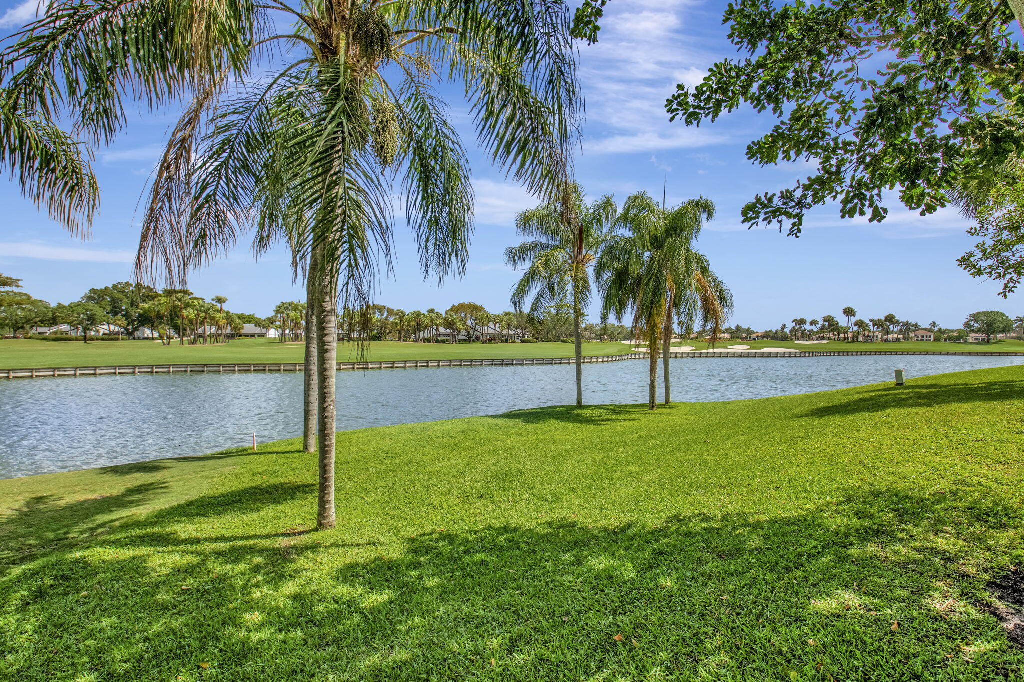 27 Eastgate Drive, Unit C Boynton Beach, FL 33436 - Photo 42 of 87 a view of a park and palm trees