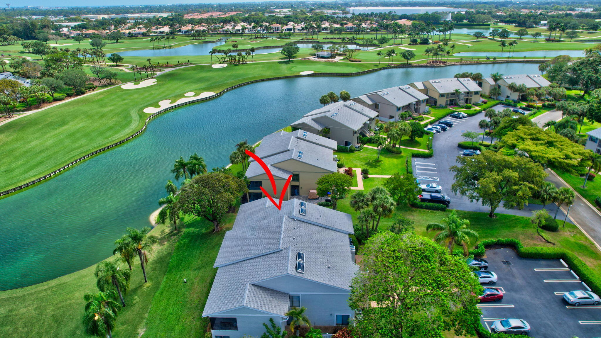 27 Eastgate Drive, Unit C Boynton Beach, FL 33436 - Photo 53 of 87 an aerial view of a houses with outdoor space and lake view