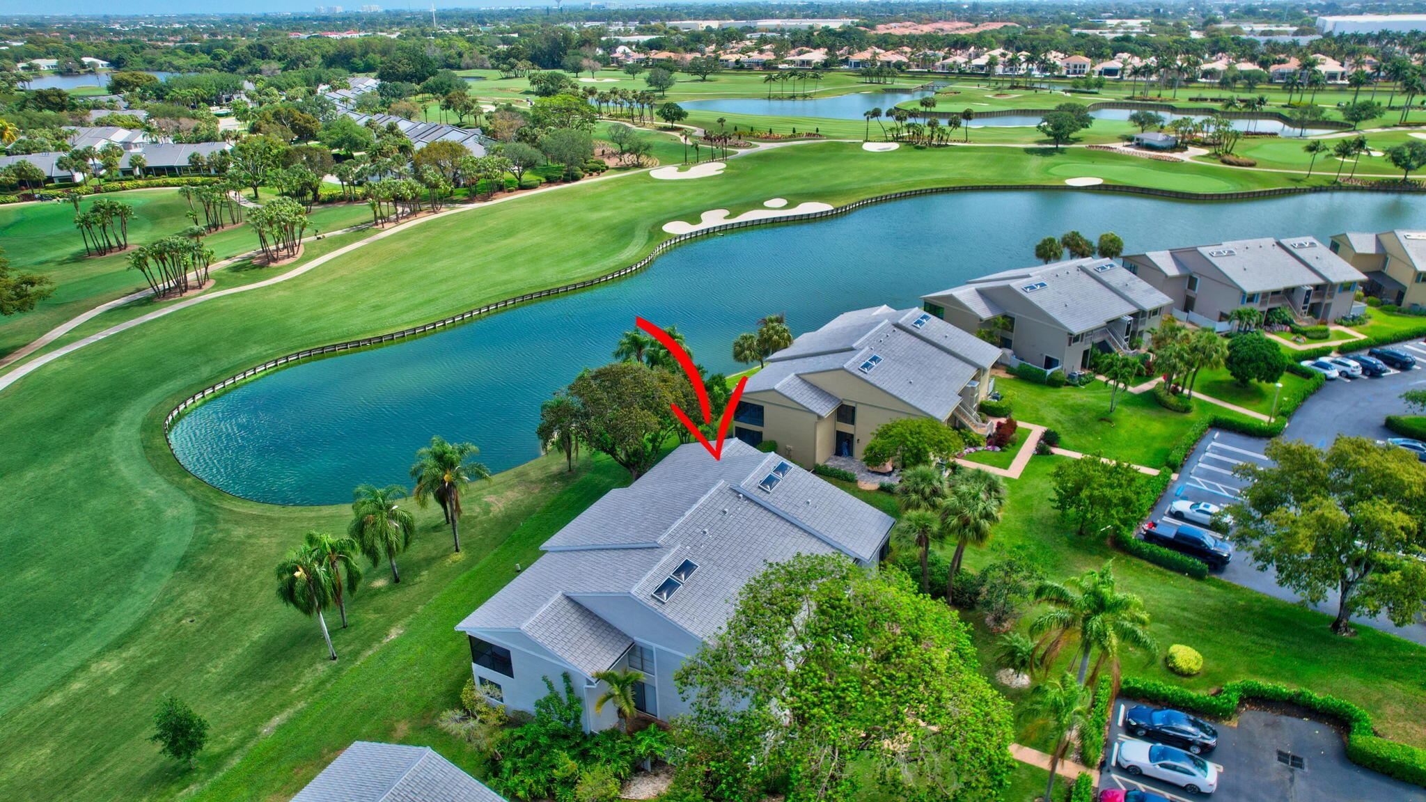 27 Eastgate Drive, Unit C Boynton Beach, FL 33436 - Photo 54 of 87 an aerial view of a house with a lake view