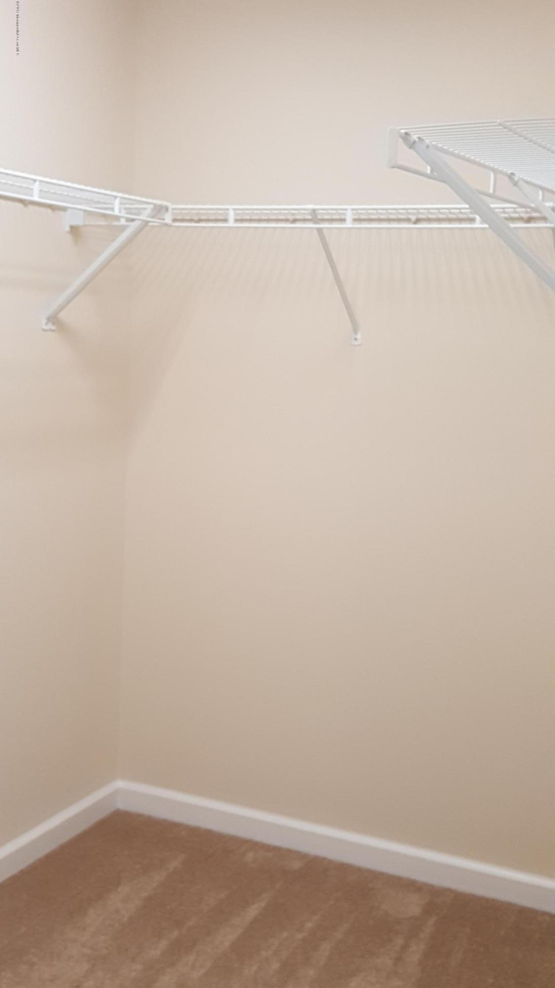 297 Spring Street, Unit 12 Red Bank, NJ 07701 - Photo 13 of 16 Left side of huge Master Closet