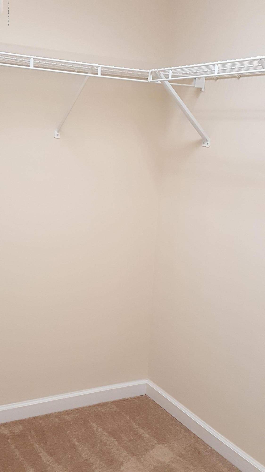 297 Spring Street, Unit 12 Red Bank, NJ 07701 - Photo 14 of 16 Right side of huge Master Closet