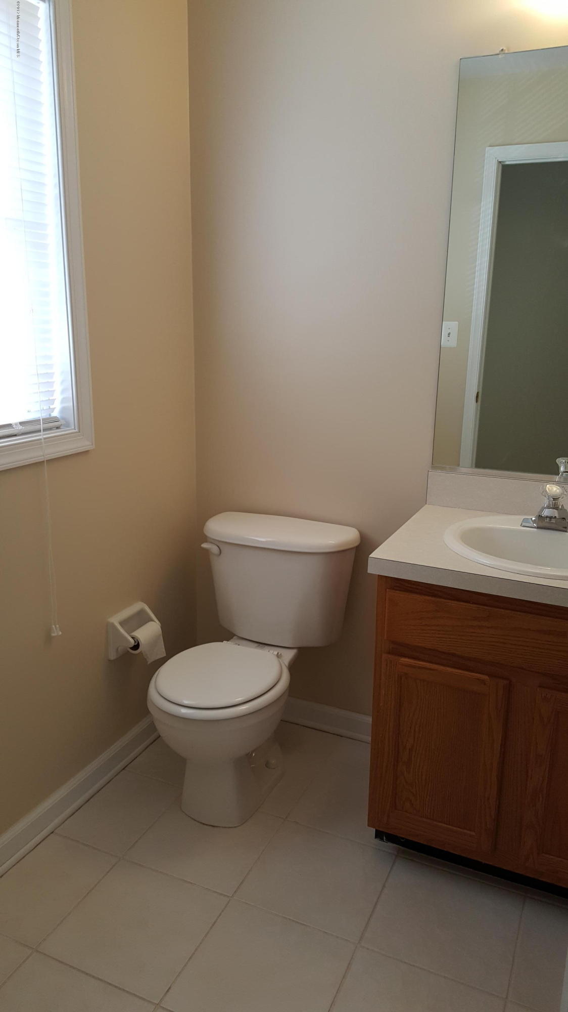 297 Spring Street, Unit 12 Red Bank, NJ 07701 - Photo 6 of 16 Guest Powder Room