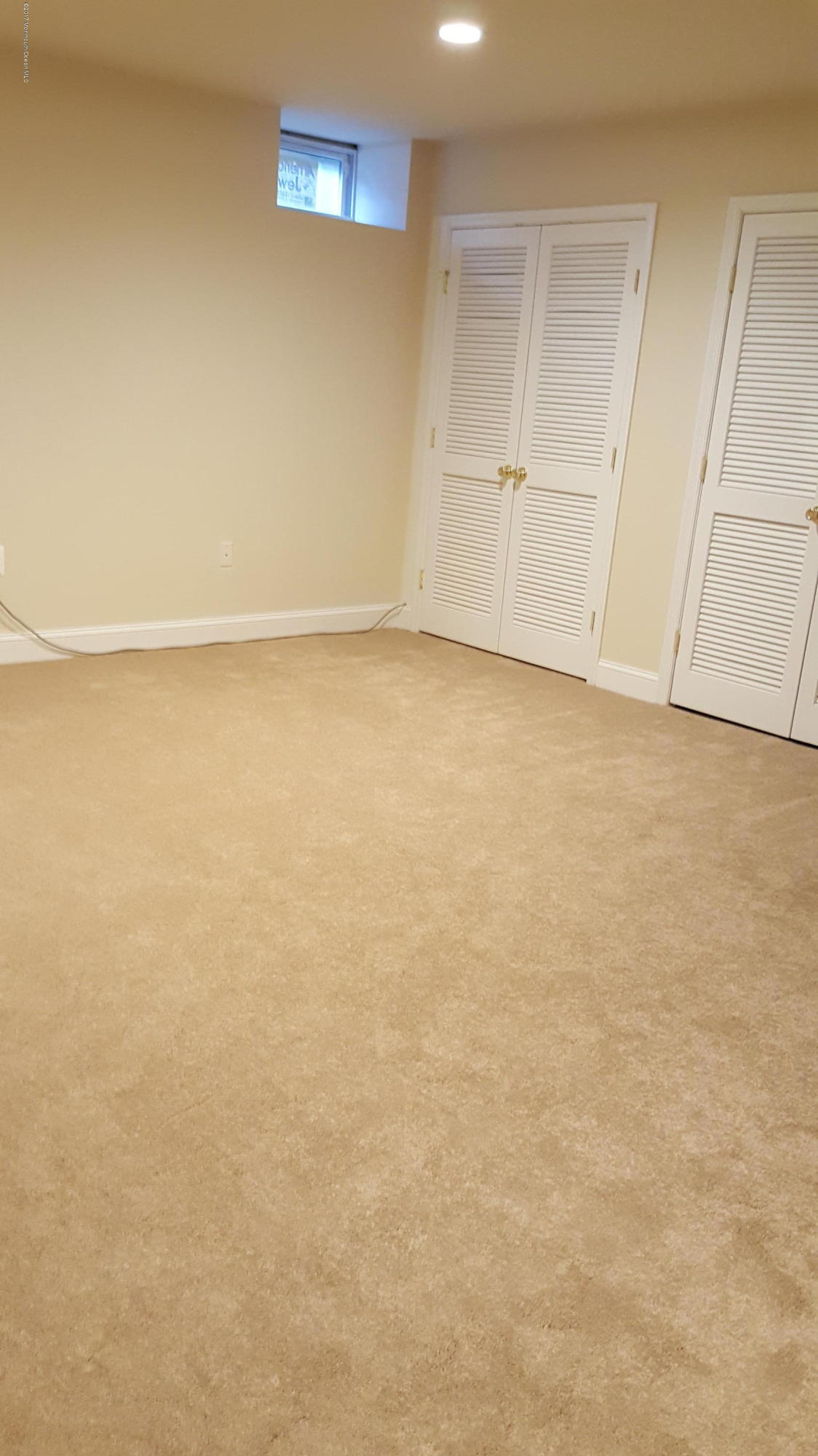 297 Spring Street, Unit 12 Red Bank, NJ 07701 - Photo 8 of 16 Finished basement