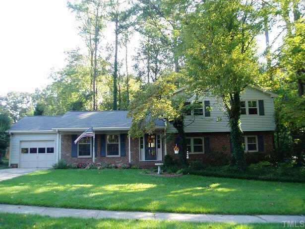 820 Purdue Street Raleigh, NC 27609 - Photo 1 of 1 a front view of a house with a garden