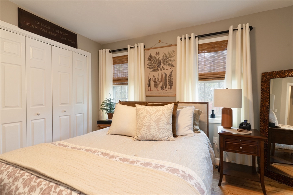 1 Leno Road Holland, MA 01521 - Photo 21 of 40 a bedroom with a large bed and a window