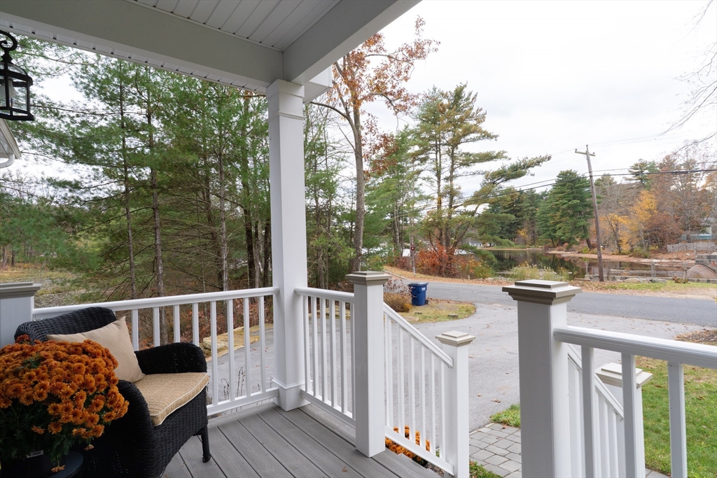 1 Leno Road Holland, MA 01521 - Photo 27 of 40 a view of a deck with couches and wooden floor
