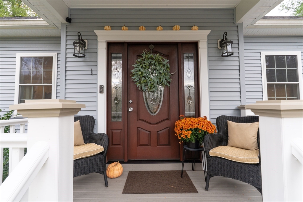 1 Leno Road Holland, MA 01521 - Photo 4 of 40 a front view of a house with outdoor seating