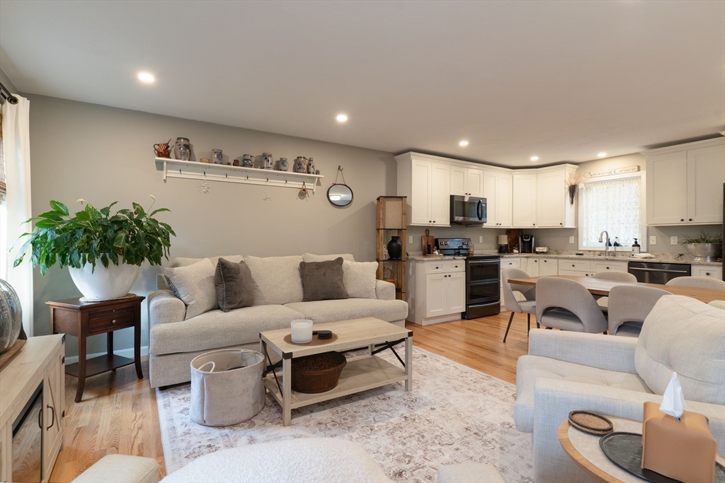 1 Leno Road Holland, MA 01521 - Photo 8 of 40 a living room with furniture kitchen view and a potted plant