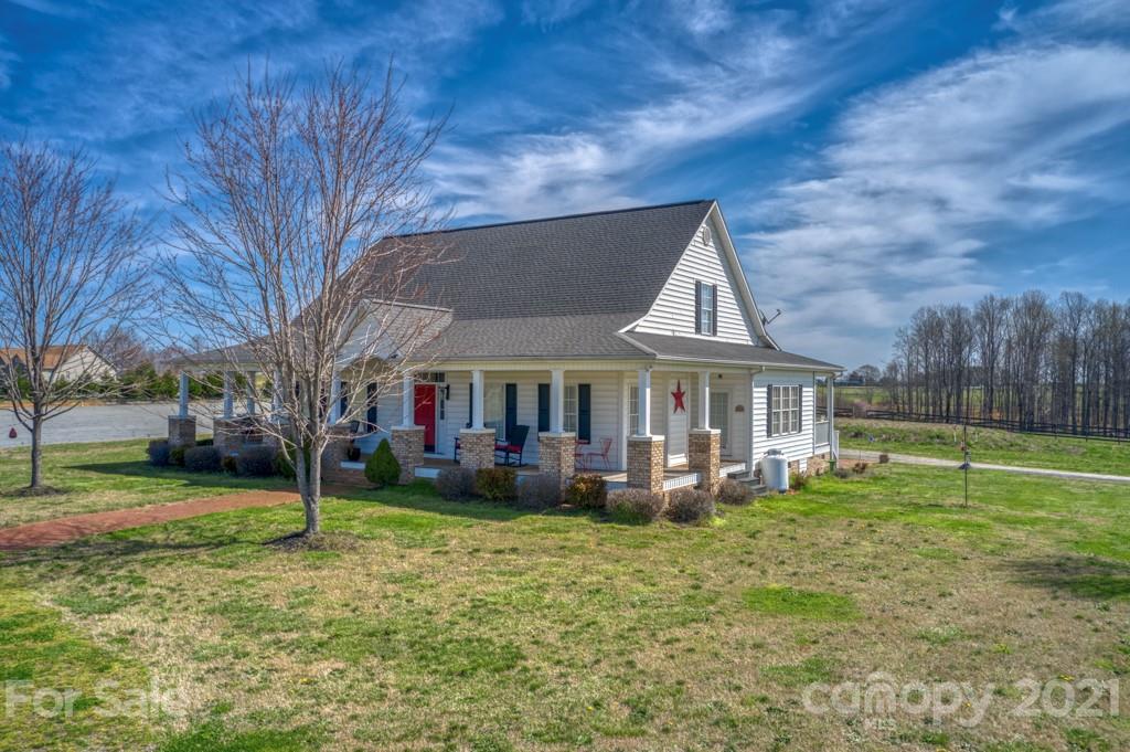 1481 Airport Road Rutherfordton, NC 28139 - Photo 14 of 47 a front view of a house with a yard