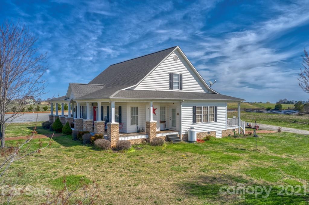 1481 Airport Road Rutherfordton, NC 28139 - Photo 15 of 47 a front view of a house with garden