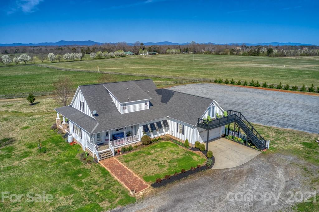 1481 Airport Road Rutherfordton, NC 28139 - Photo 16 of 47 a view of a house with a yard and a fountain
