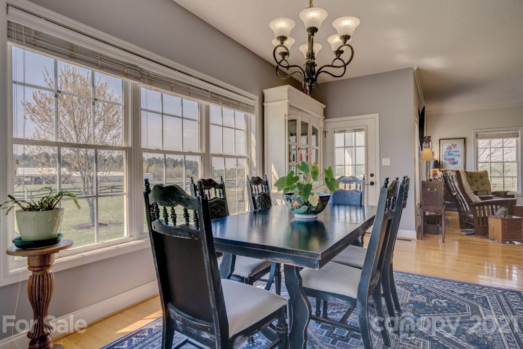 1481 Airport Road Rutherfordton, NC 28139 - Photo 26 of 47 a view of a dining room with furniture window and wooden floor