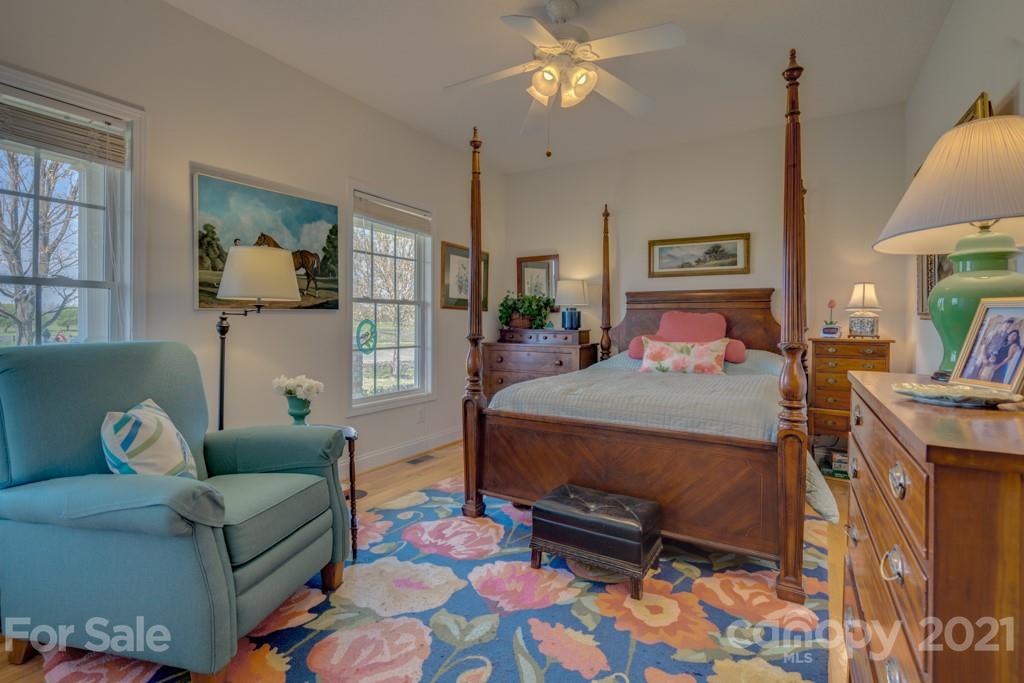1481 Airport Road Rutherfordton, NC 28139 - Photo 33 of 47 a bedroom with a bed and wooden floor