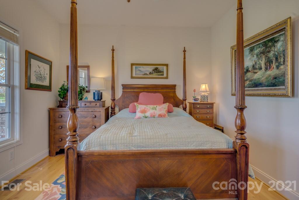 1481 Airport Road Rutherfordton, NC 28139 - Photo 34 of 47 a bedroom with a bed and wooden floor