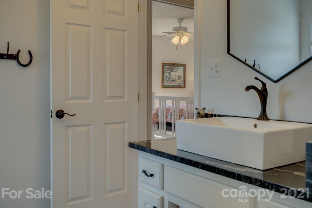 1481 Airport Road Rutherfordton, NC 28139 - Photo 43 of 47 a bathroom with a bathtub and a sink