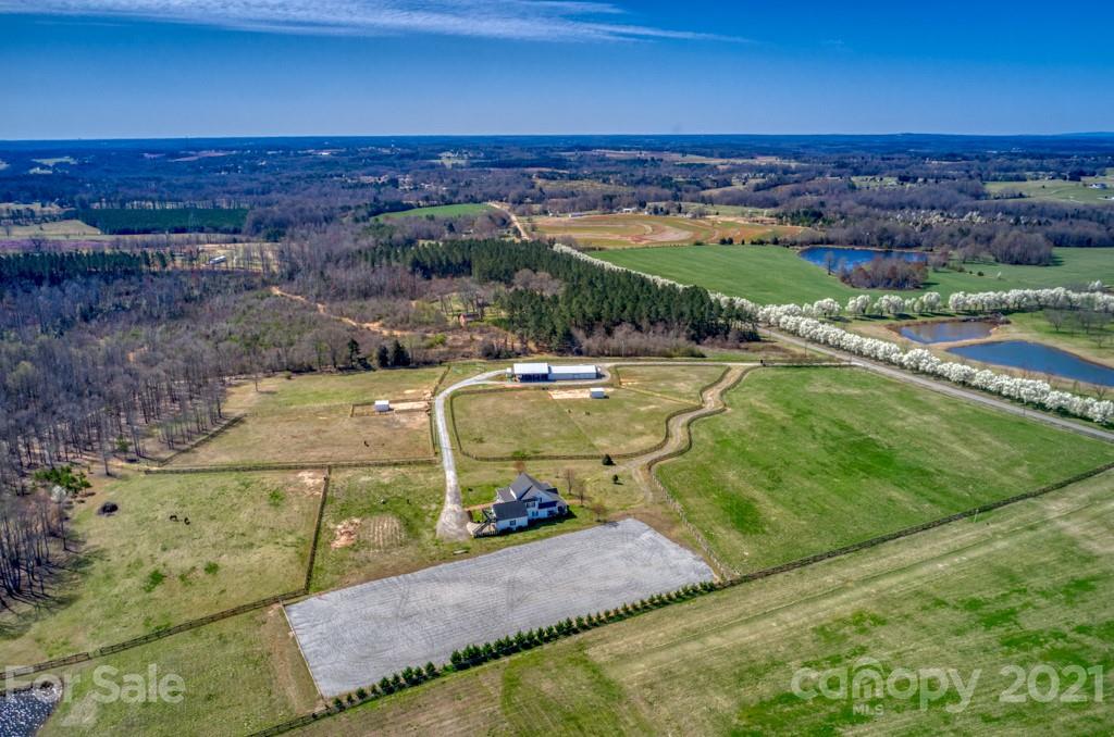1481 Airport Road Rutherfordton, NC 28139 - Photo 8 of 47 a view of a lake with a yard