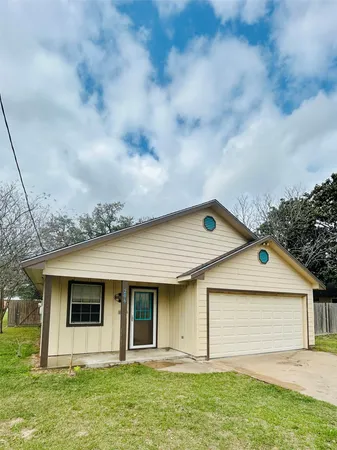 a front view of house with yard