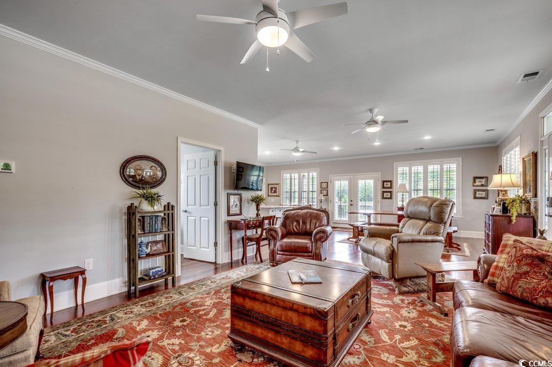 5517 Tranquil Road Conway, SC 29527 - Photo 13 of 39 Living room featuring ceiling fan, ornamental mold