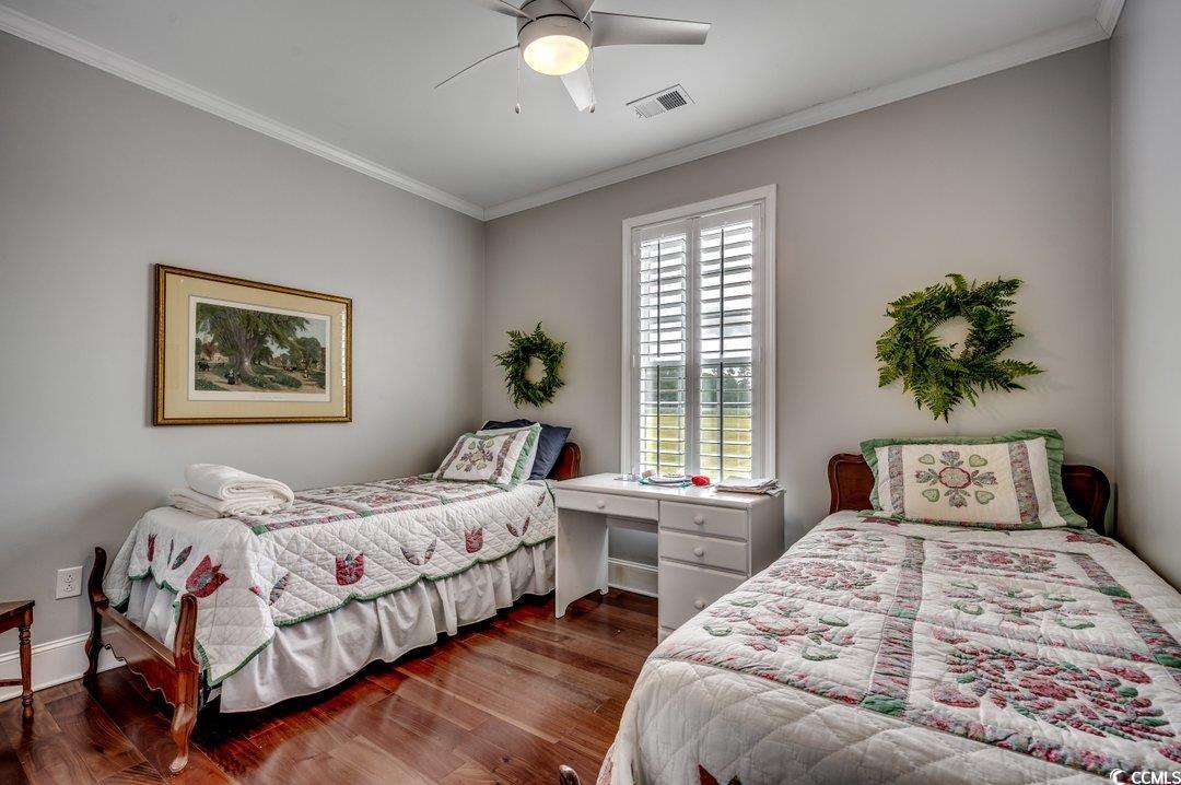 5517 Tranquil Road Conway, SC 29527 - Photo 20 of 39 Bedroom featuring ceiling fan, crown molding, and