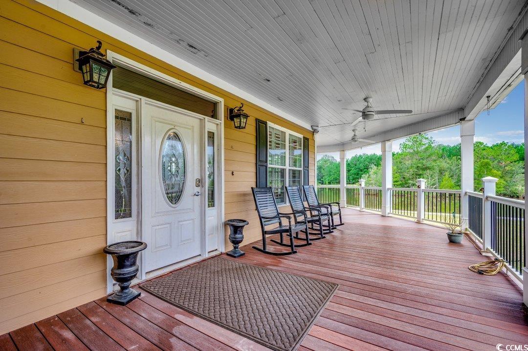 5517 Tranquil Road Conway, SC 29527 - Photo 21 of 39 Wooden deck featuring ceiling fan and covered porc
