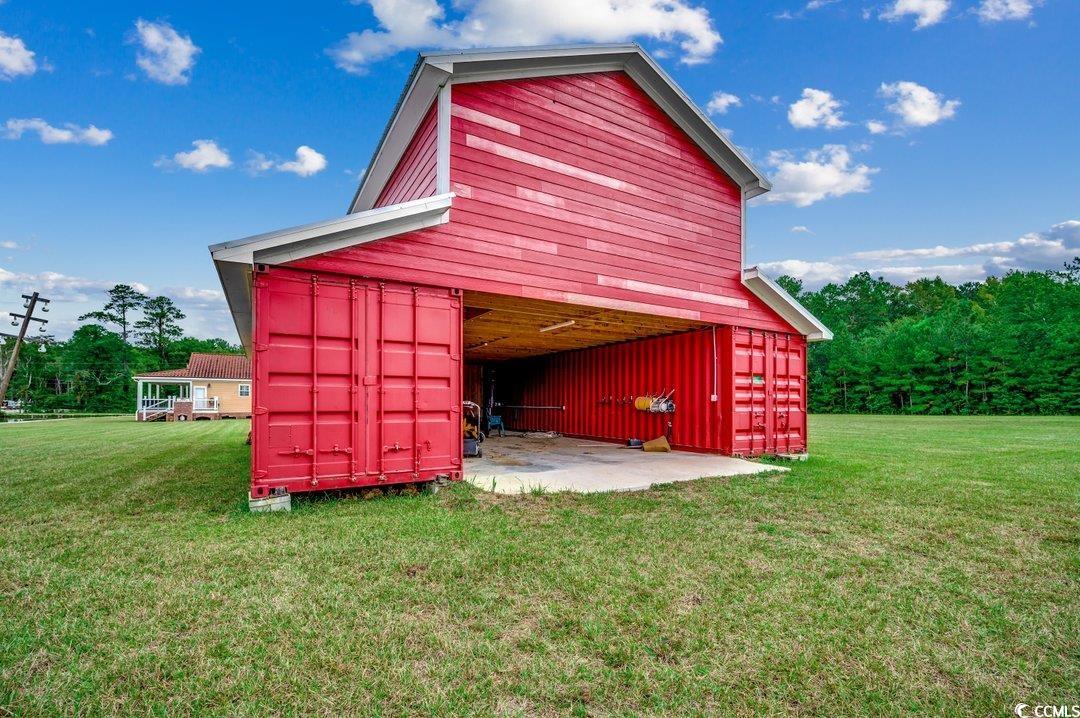 5517 Tranquil Road Conway, SC 29527 - Photo 29 of 39 View of outbuilding featuring a yard