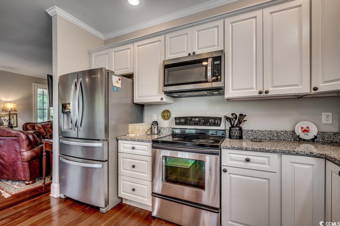 5517 Tranquil Road Conway, SC 29527 - Photo 9 of 39 Kitchen featuring ornamental molding, stainless st