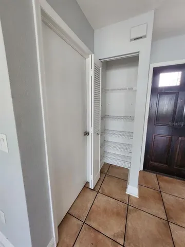 a view of an empty walk in closet