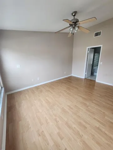 a view of a living room and bathroom