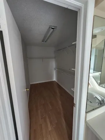 a view of a house with a garden and yard