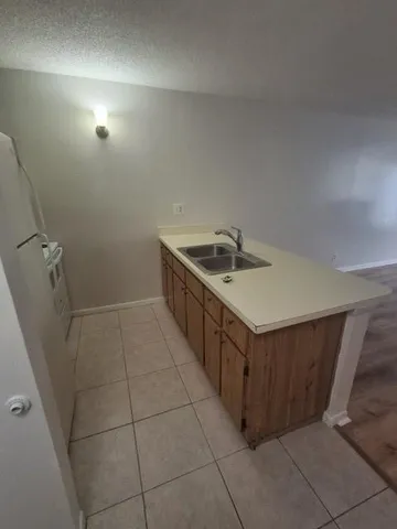 $1,375 | 2771 Riverside Drive, Unit 414A, Coral Springs, FL 33065