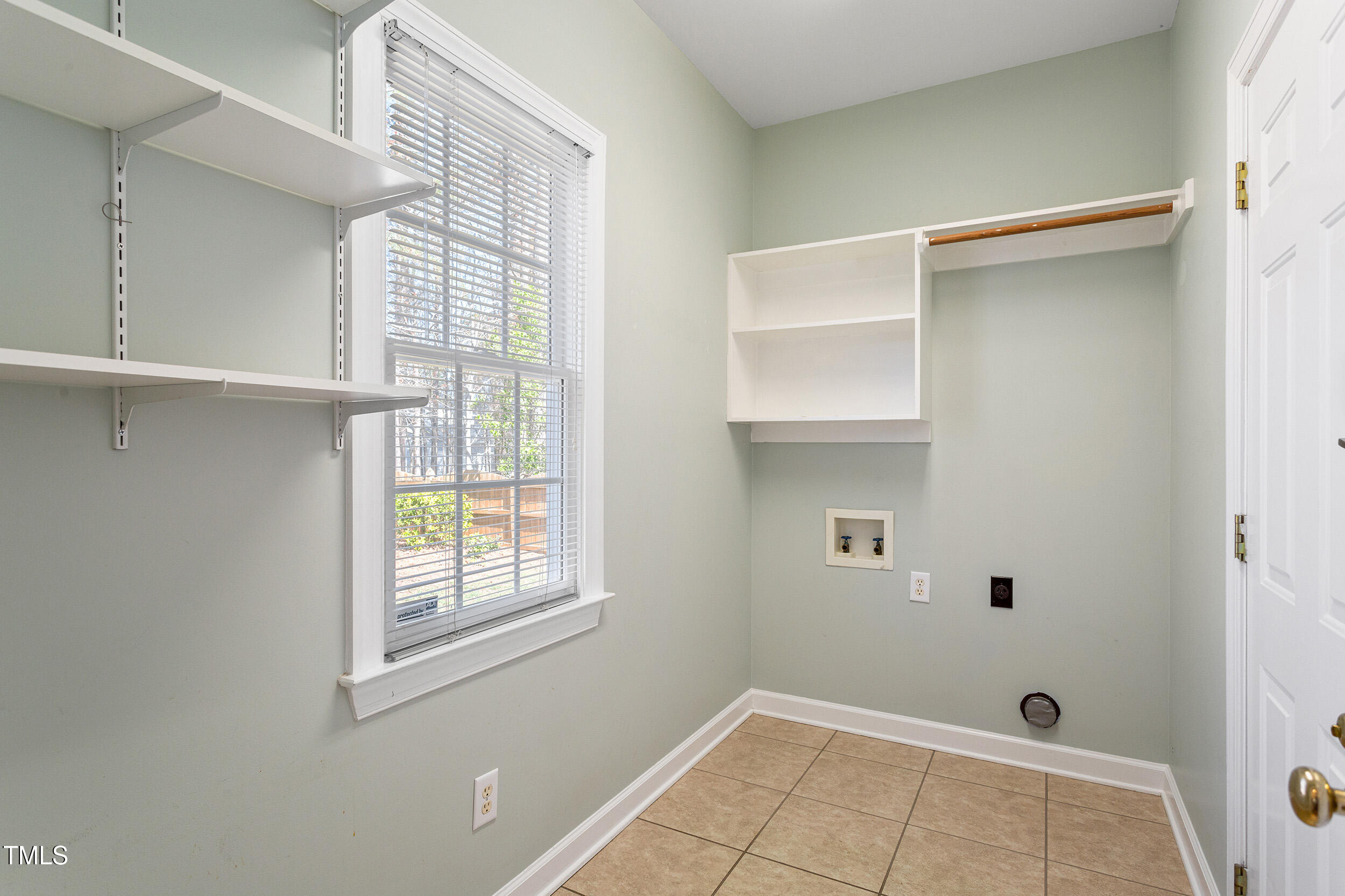 501 Nantucket Drive Cary, NC 27513 - Photo 17 of 34 a view of an empty room with a window