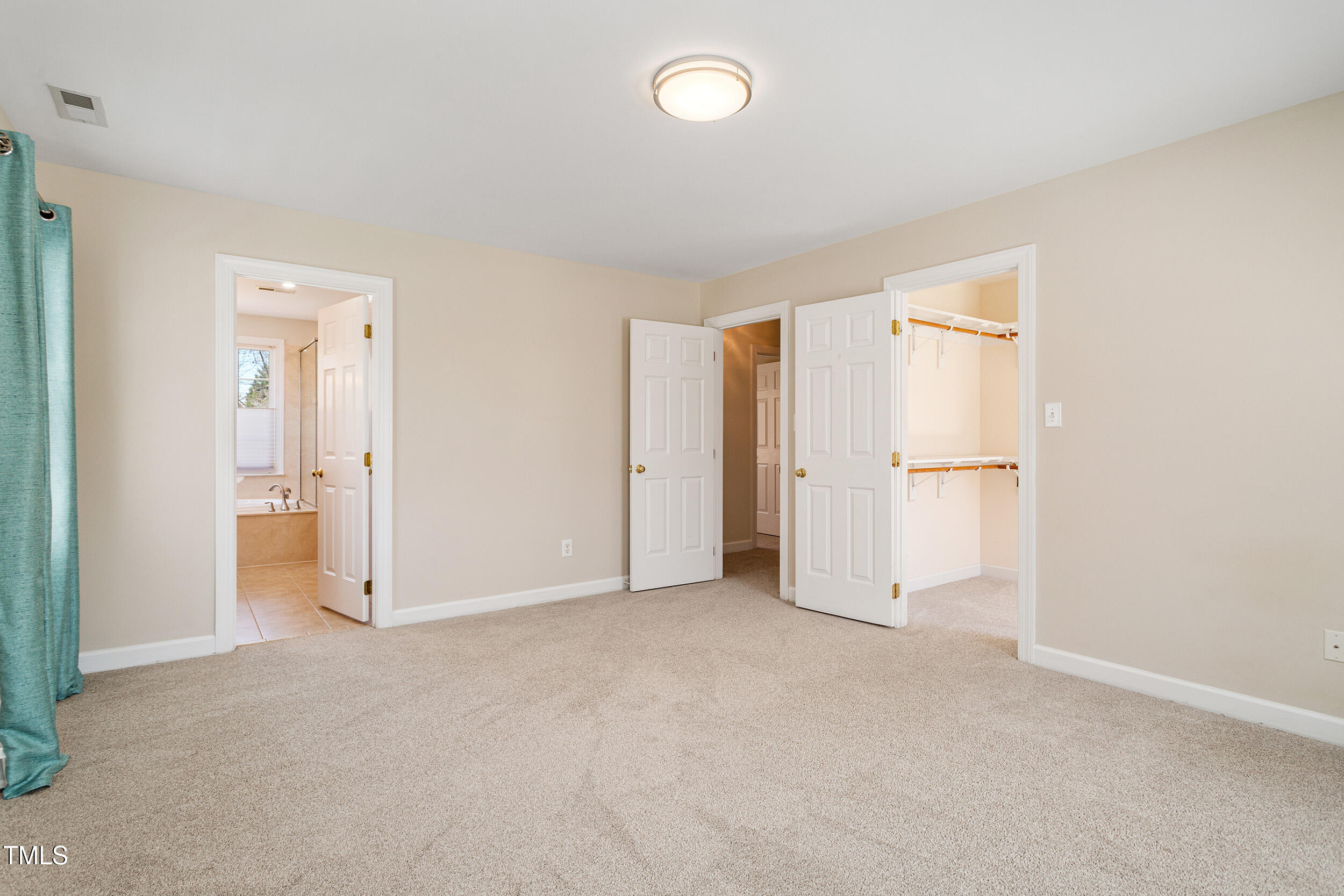 501 Nantucket Drive Cary, NC 27513 - Photo 20 of 34 an empty room with a bathroom