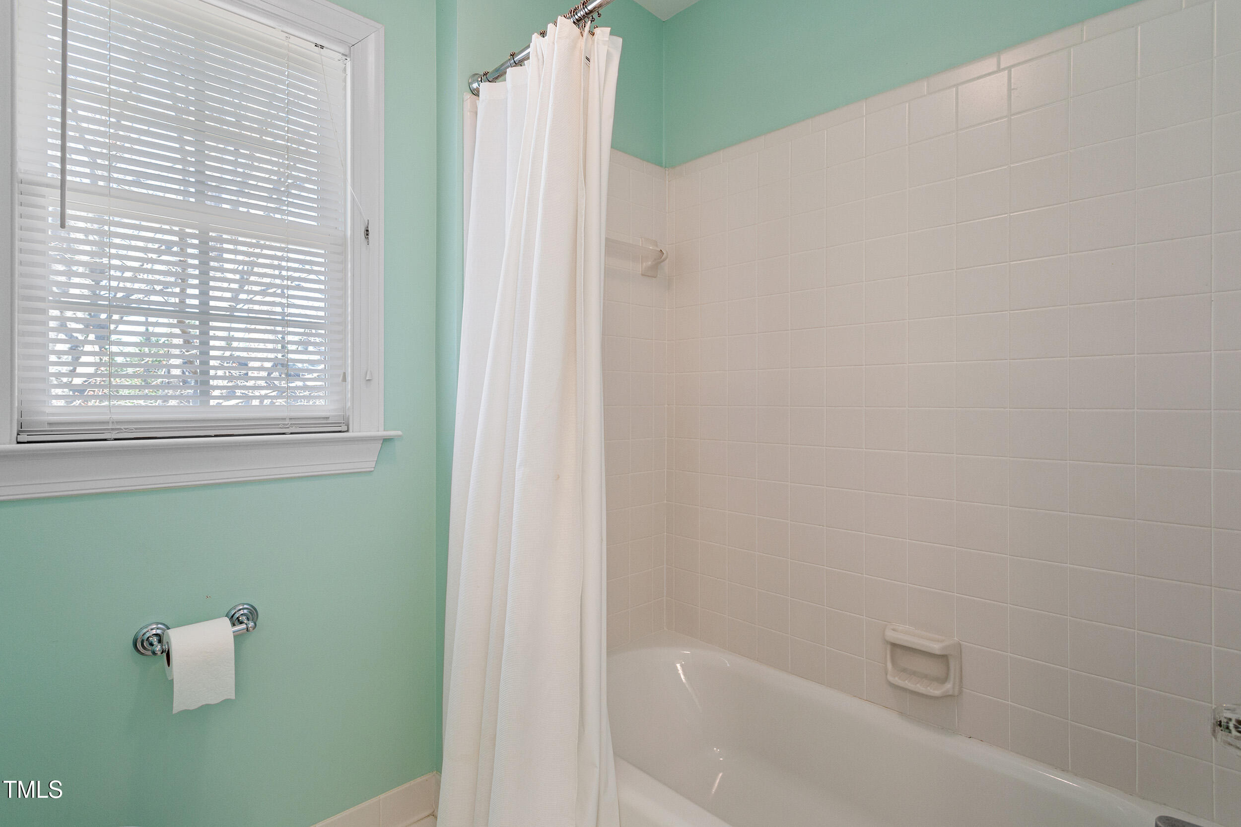 501 Nantucket Drive Cary, NC 27513 - Photo 27 of 34 a bathroom with a bathtub