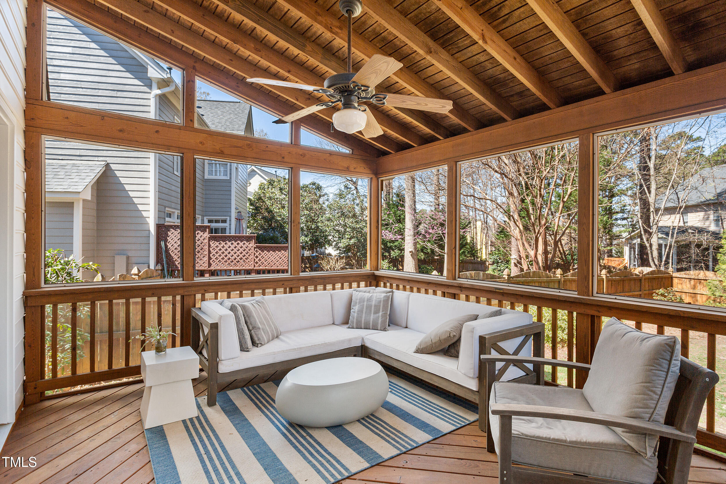 501 Nantucket Drive Cary, NC 27513 - Photo 31 of 34 a balcony with wooden floor outdoor seating and stairs