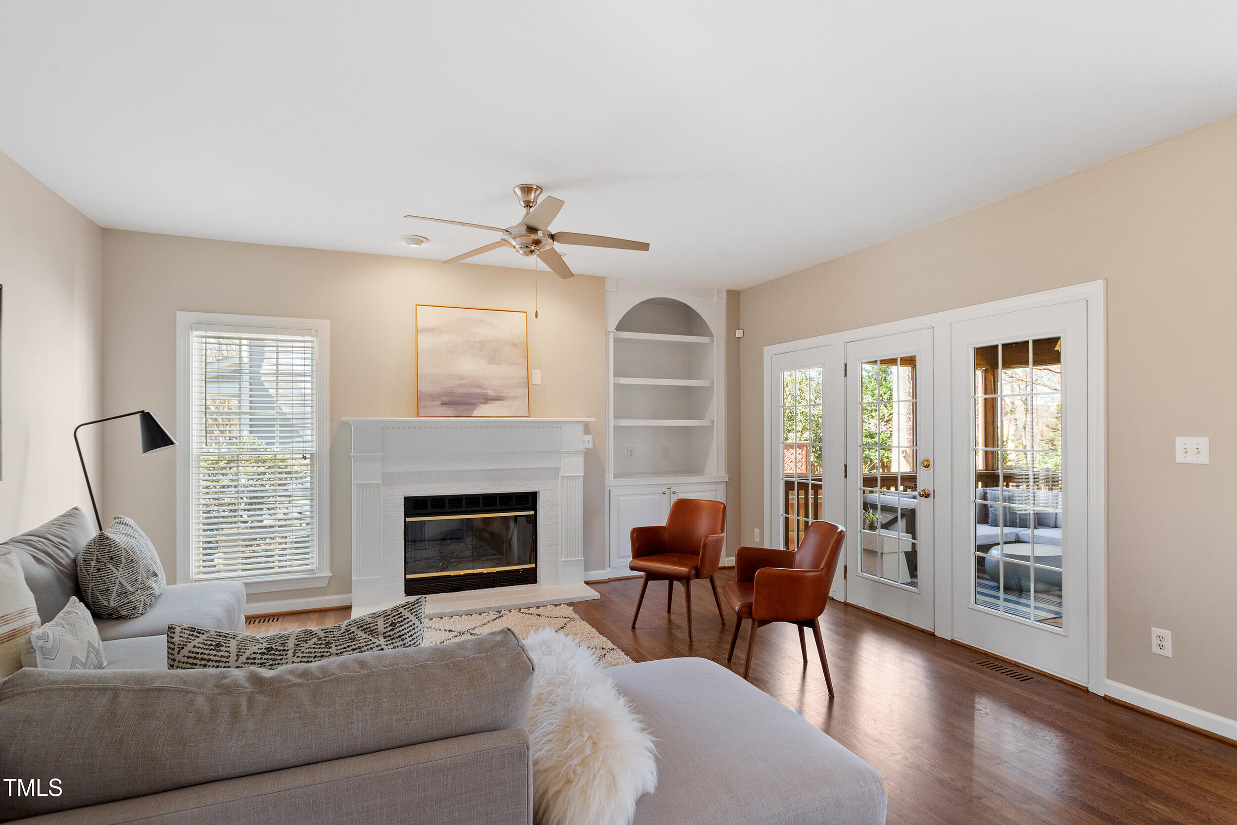 501 Nantucket Drive Cary, NC 27513 - Photo 5 of 34 a living room with furniture and a fireplace