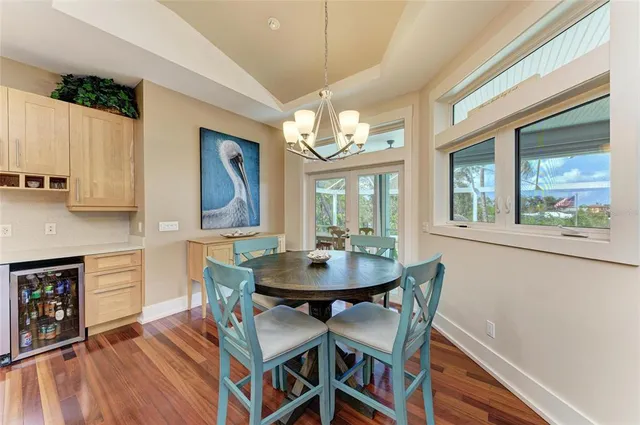 a spacious bedroom with a bed and a large window