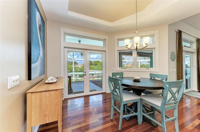 a bedroom with a large bed and a large window