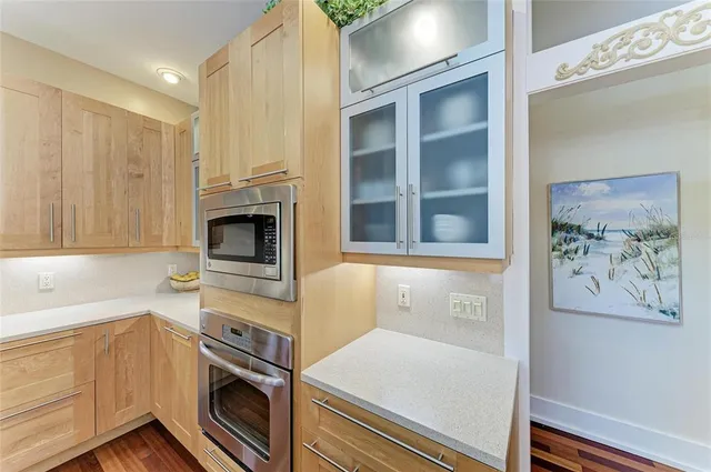 a view of a patio with a table chairs and a patio