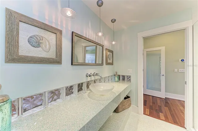 a view of a swimming pool with a patio