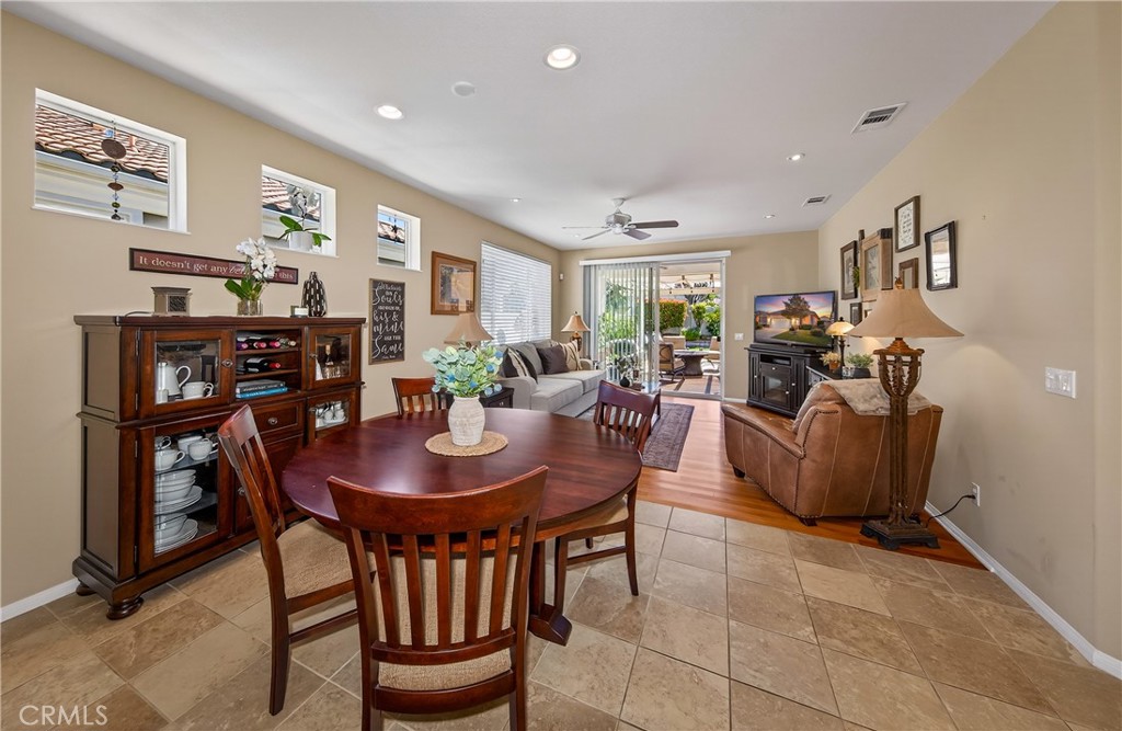 1760 Scottsdale Road Beaumont, CA 92223 - Photo 11 of 37 OPEN CONCEPT DINING WITH VIEW TOWARDS FAMILY ROOM AND PATIO