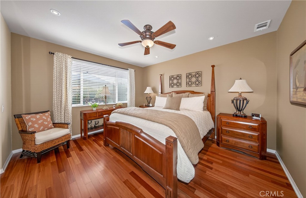 1760 Scottsdale Road Beaumont, CA 92223 - Photo 15 of 37 PRIMARY BEDROOM WITH BRAZILIAN CHERRY WOOD FLOORS!