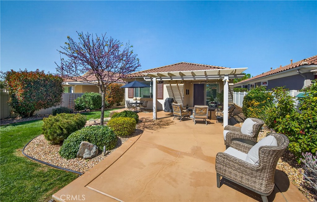 1760 Scottsdale Road Beaumont, CA 92223 - Photo 20 of 37 SPACIOUS FULLY LANDSCAPED BACK YARD WITH GRASS