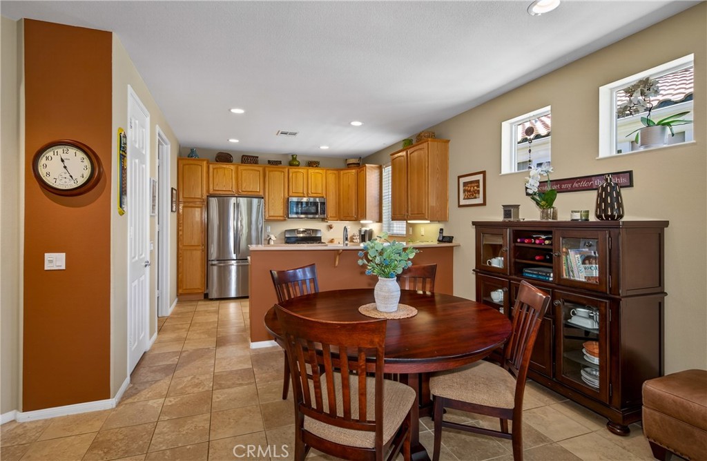 1760 Scottsdale Road Beaumont, CA 92223 - Photo 6 of 37 OPEN CONCEPT. DINING AREA VIEW TOWARDS KITCHEN