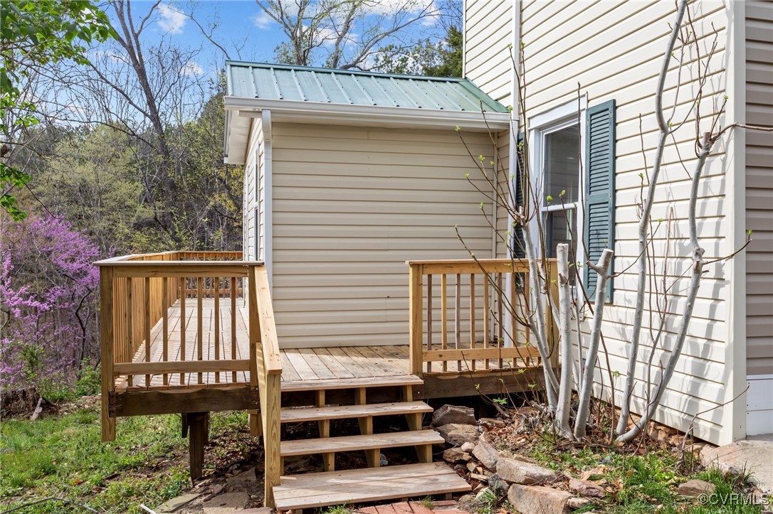 1413 First Rock Road Prospect, VA 23960 - Photo 34 of 50 Back deck wraps around to the front with steps to