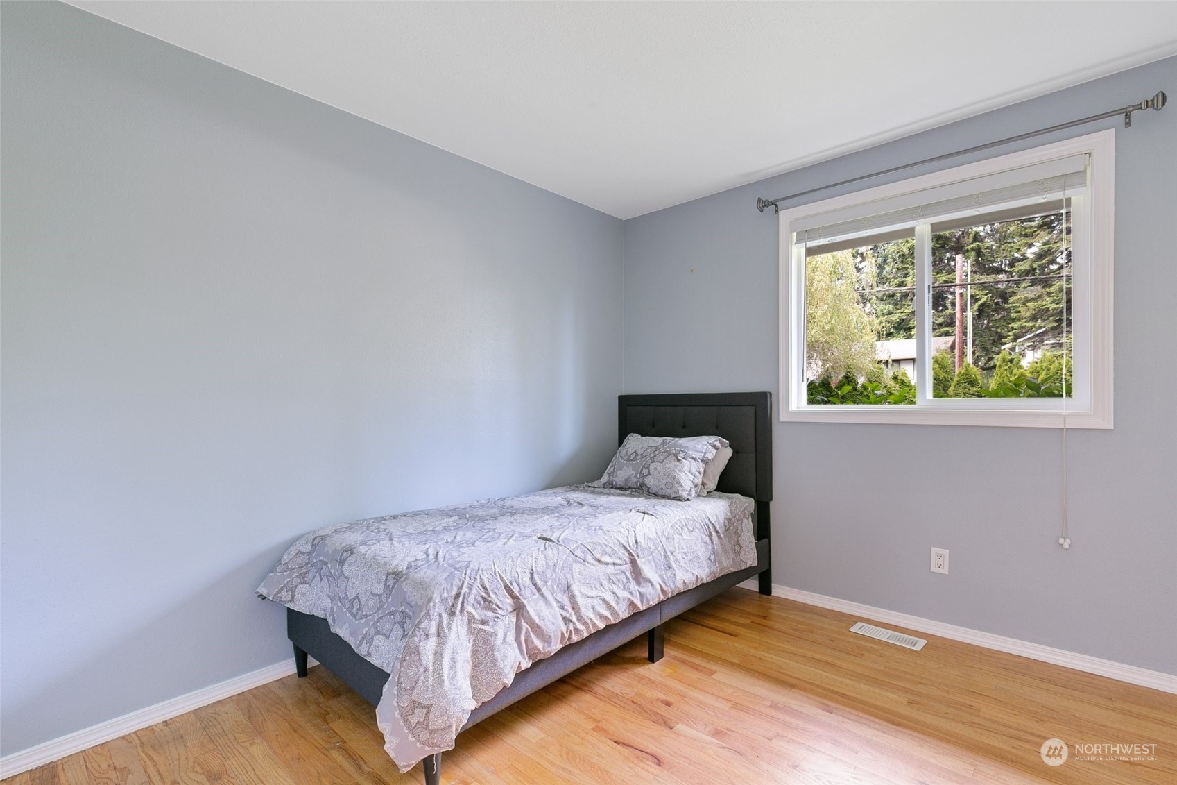 5409 Seahurst Avenue Everett, WA 98203 - Photo 15 of 26 a bedroom with a bed and window