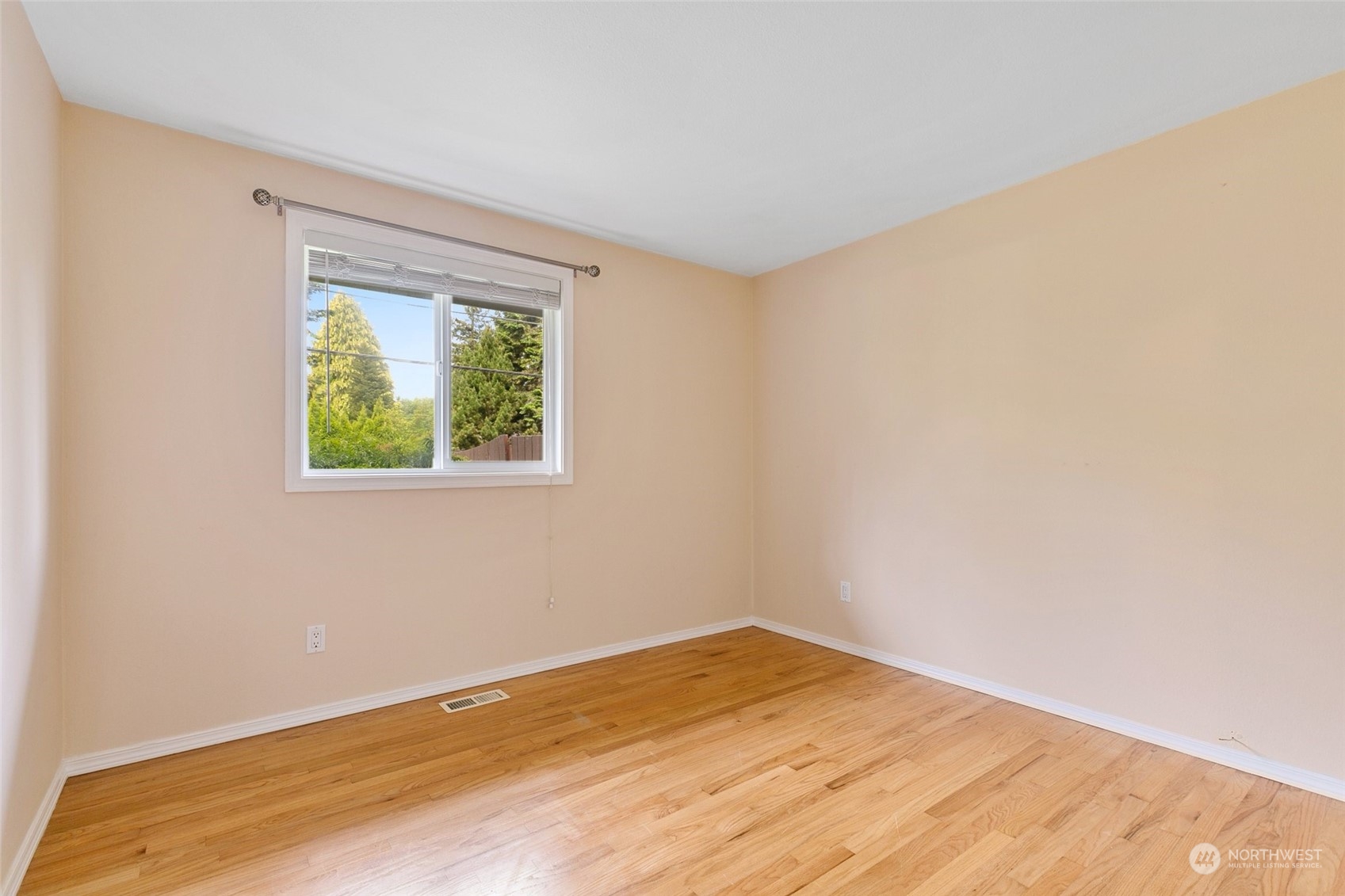 5409 Seahurst Avenue Everett, WA 98203 - Photo 16 of 26 a view of empty room with wooden floor