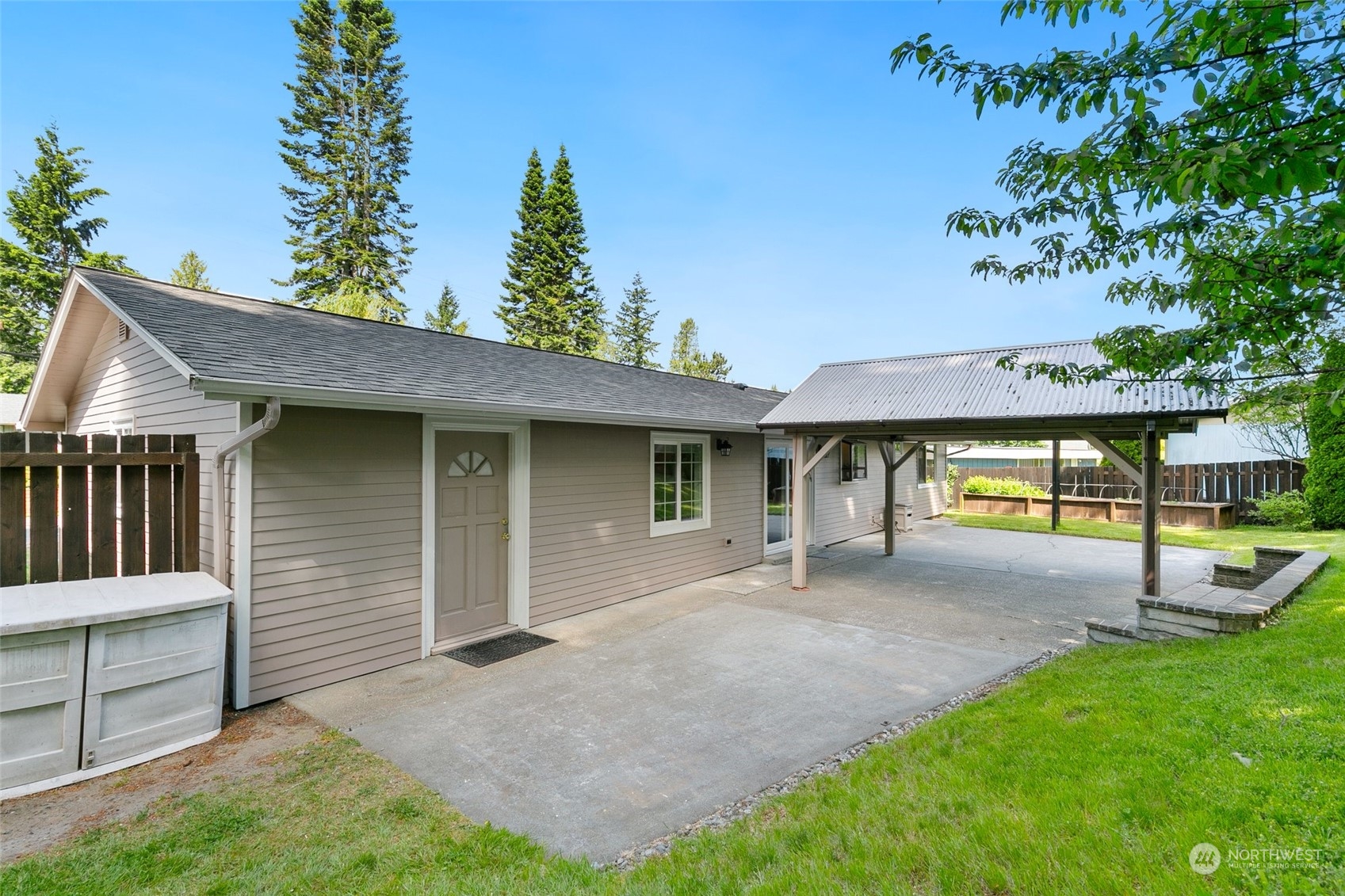 5409 Seahurst Avenue Everett, WA 98203 - Photo 20 of 26 a front view of a house with garden