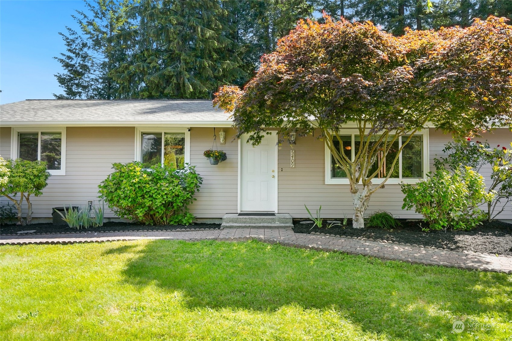 5409 Seahurst Avenue Everett, WA 98203 - Photo 2 of 26 a view of a house with a yard
